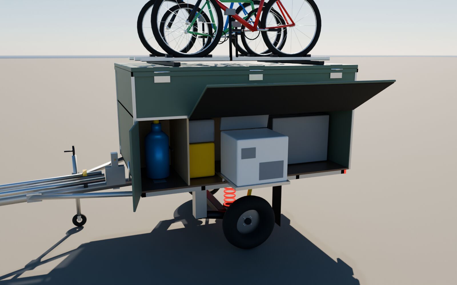 La remorque côté frigo, volet relevé, frigo sorti sur sa coulisse, porte du coffre gaz ouverte sur une bouteille bleue
